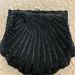 Beaded formal event bag with silver chain.